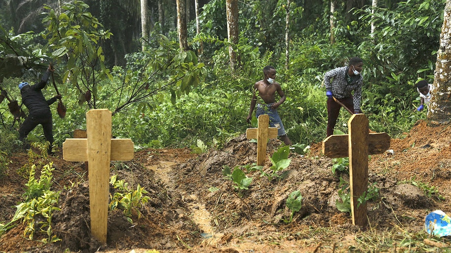 People digging graves