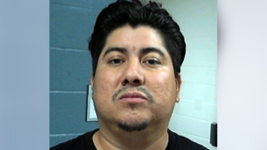 DHS mugshot of Jelber Gomez Lopez.