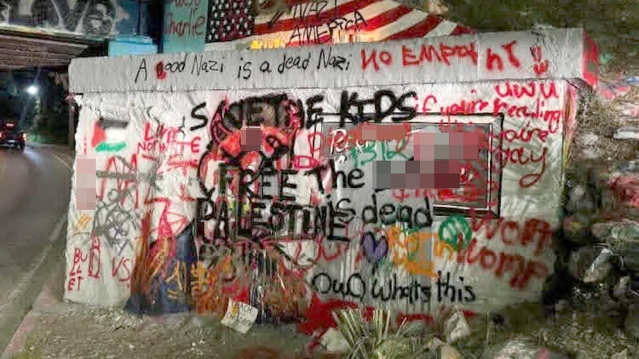 Defaced Charlie Kirk mural