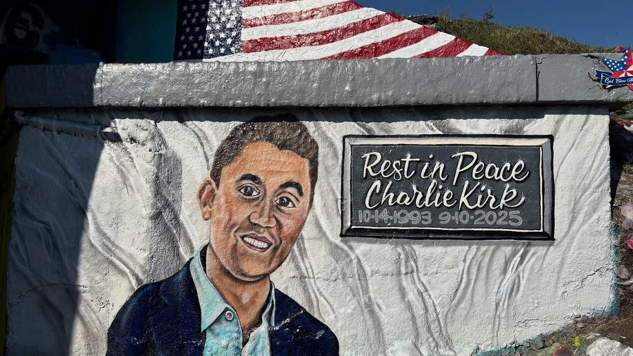 Young people restore Charlie Kirk memorial mural with Bible verses after vandals deface tribute