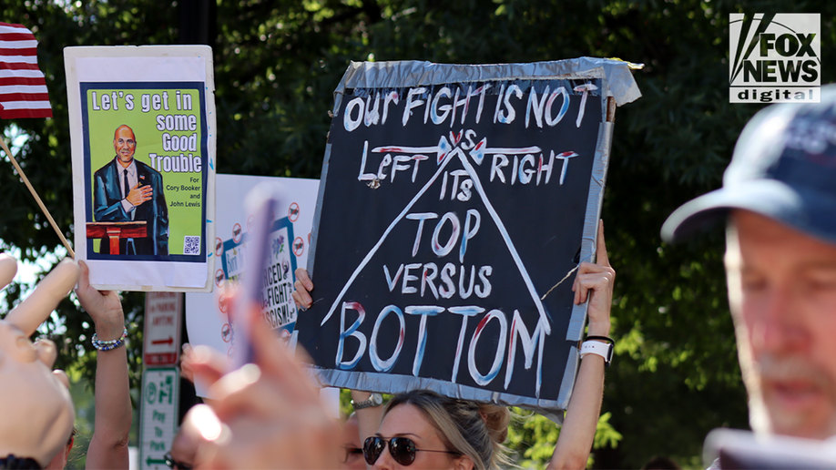 sign at labor day protest