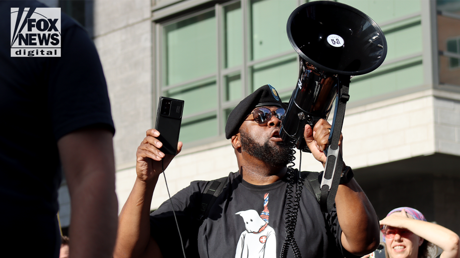 veteran leads chant at labor dayprotest