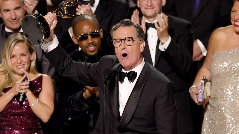 Colbert wins Emmy for 'Late Show' after cancellation, says he loves his country more than ever