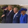 President Donald Trump salutes alongside King Charles III and Queen Camilla, with Melania Trump on the left, as they listen to the national anthem at Windsor Castle on September 17, 2025.