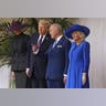 President Donald Trump, King Charles III, Queen Camilla, and Melania Trump wait to review the Guard of Honour at Windsor Castle.