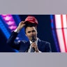 Charlie Kirk with a MAGA hat