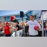 Charlie Kirk before he was shot hands out hats to the crowd
