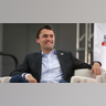 Charlie Kirk listens onstage during Politicon 2018 event