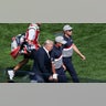 Donald Trump walks with Bryson DeChambeau