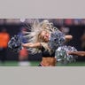 A cheerleader performing