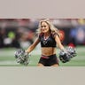 A Falcons cheerleader performs for the crowd