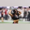 Cheerleader is in mid-performnace