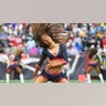 Patriots cheerleader with her hair tossed back