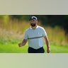 Jon Rahm celebrates
