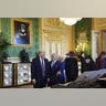 President Donald Trump, first lady Melania Trump, King Charles III, and Queen Camilla observe a special exhibition of US-related items.