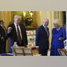 President Donald Trump, King Charles III, and Queen Camilla view items from the Royal Collection exhibition in the Green Drawing Room at Windsor Castle.