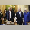 President Donald Trump, King Charles III, and Queen Camilla view a display of historical items in the Royal Collection exhibition at Windsor Castle.