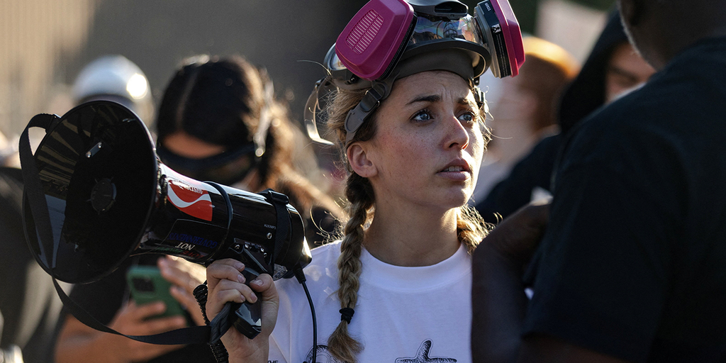 'Gen Z' Dem candidate charged with interfering with ICE posted video of herself in mob blocking unmarked SUV