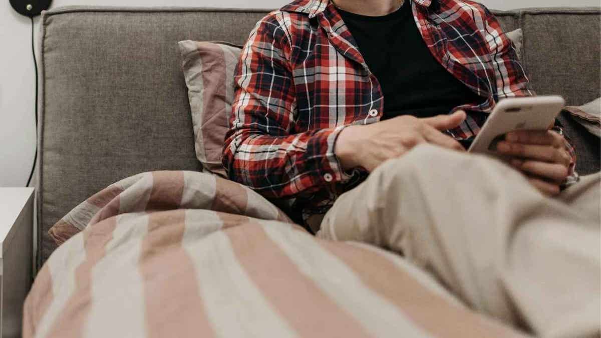 Person sitting in a bed