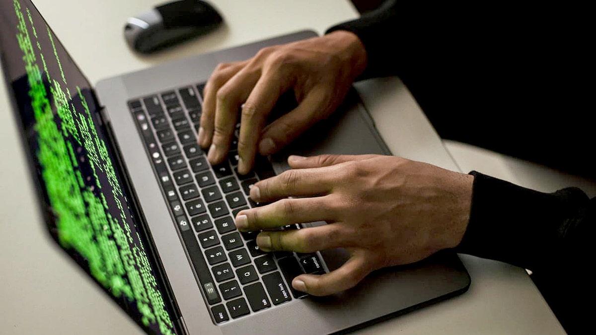 Kido nursery data breach exposes 8,000 children's personal information 3 A hacker types in a code terminal on a MacBook.