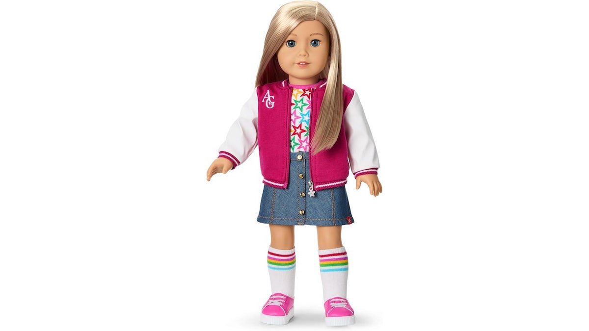 Gift her a doll that looks like her.