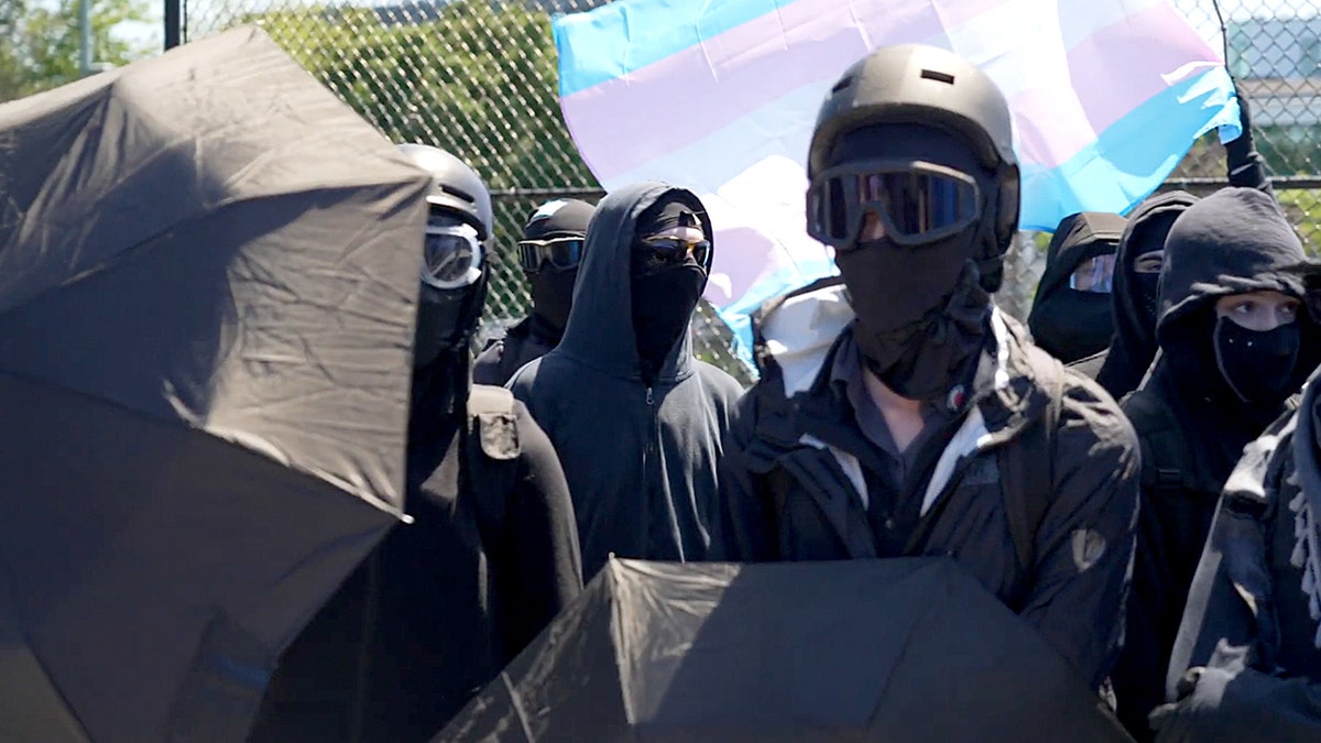 Masked black-clad Antifa at Seattle religious rally