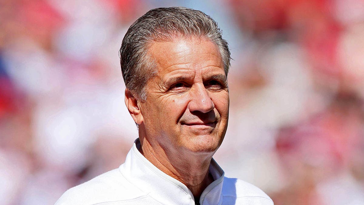 John Calipari looks on