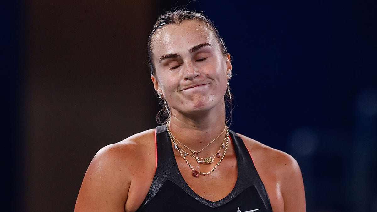 Aryna Sabalenka reacts on course