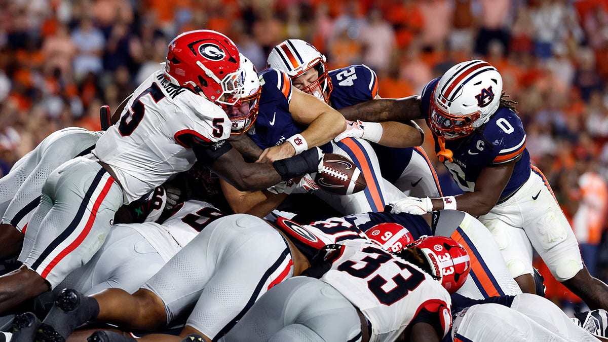 Jackson Arnold dives for the goal line