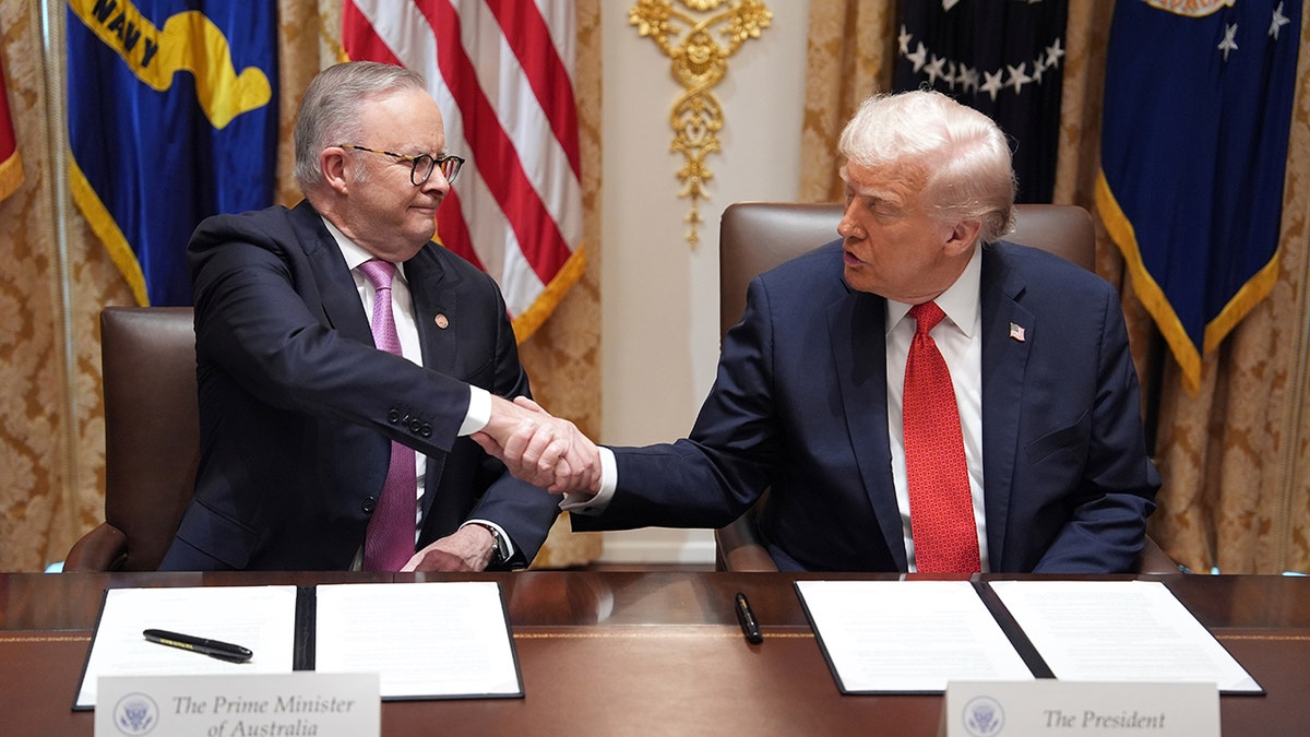 President Donald Trump, right, listens as Australian Prime Minister Anthony Albanese
