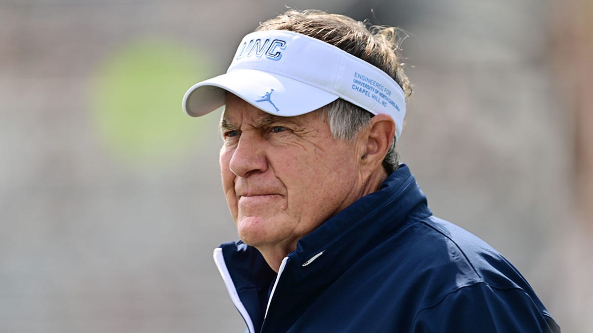 Bill Belichick looks on field