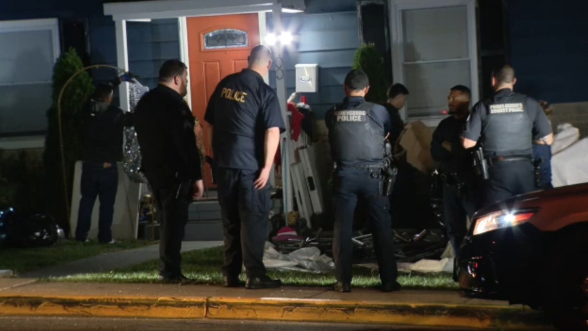 Police at the scene of the hit-and-run crash.