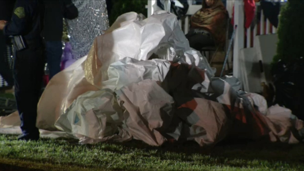 Collapsed tent near scene of fatal hit-and-run crash.