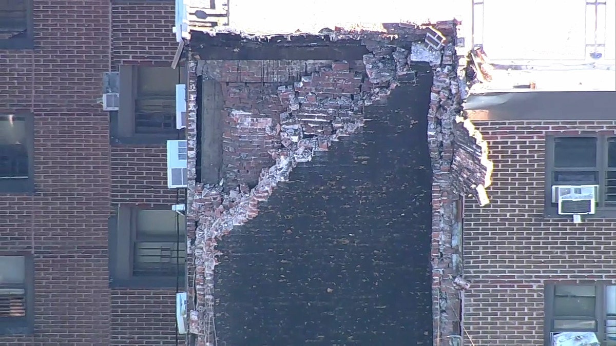 A view of the facade of a collapsed building