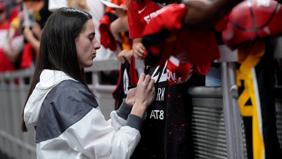 Caitlin Clark signs autographs for fans