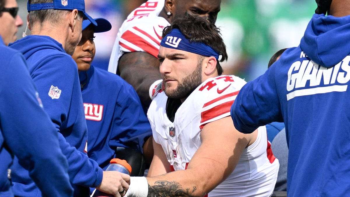 Cam Skattebo on cart