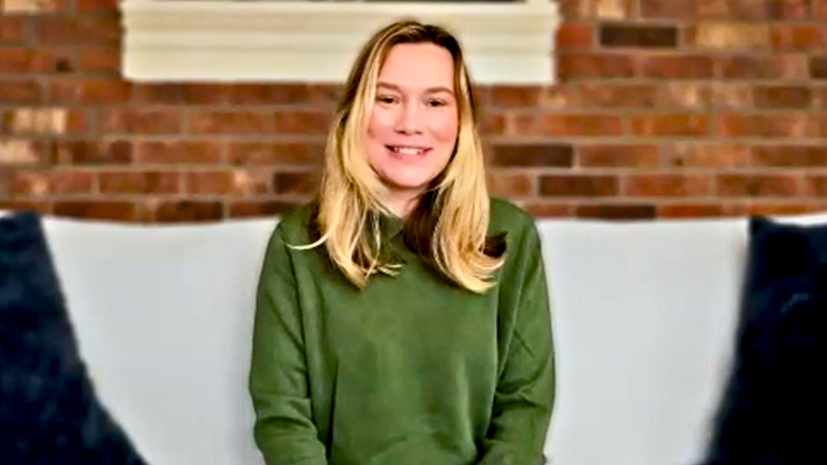 photo of blonde influencer smiling during Zoom interview