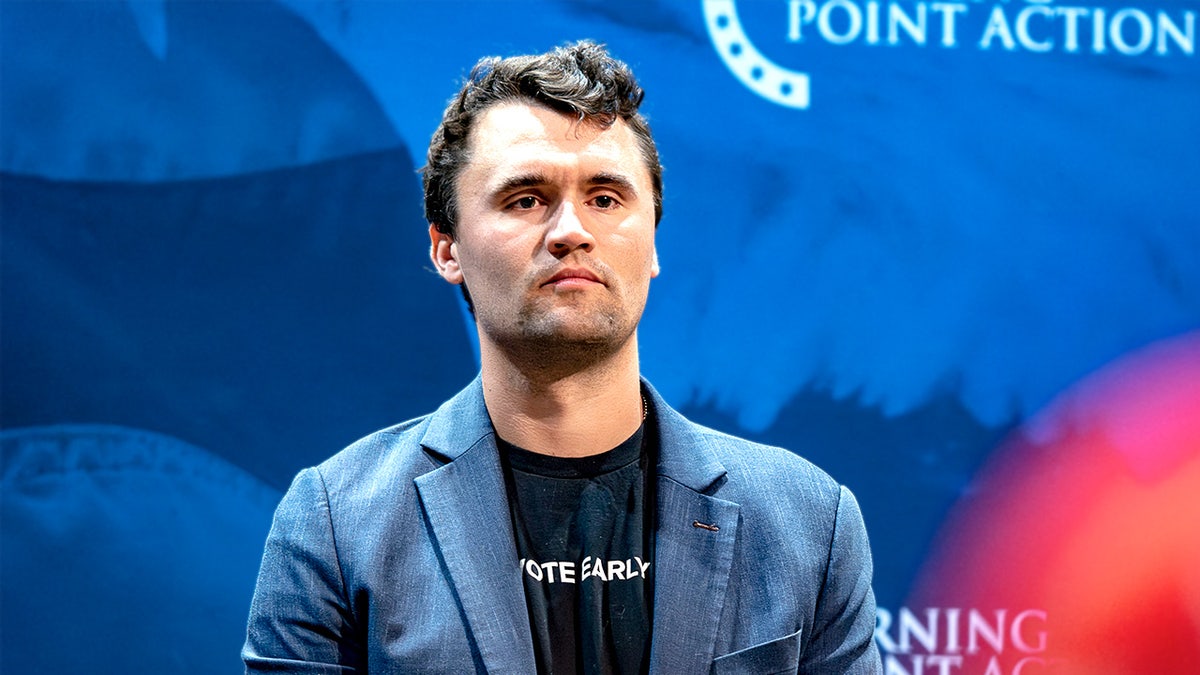 Charlie Kirk gets ready to speak before a Turning Point USA event