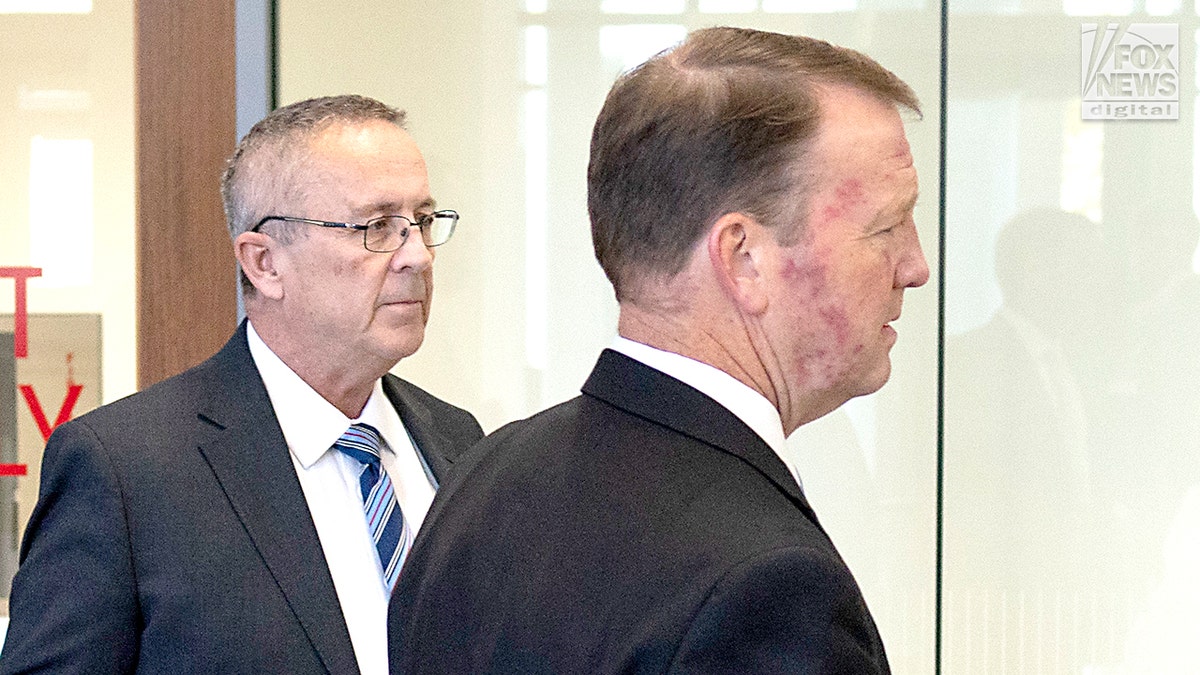 Prosecutors Jeffrey S. Gray and Ryan McBride standing outside Utah County District Court in Provo Utah