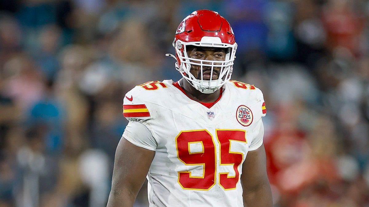 Chris Jones looks on