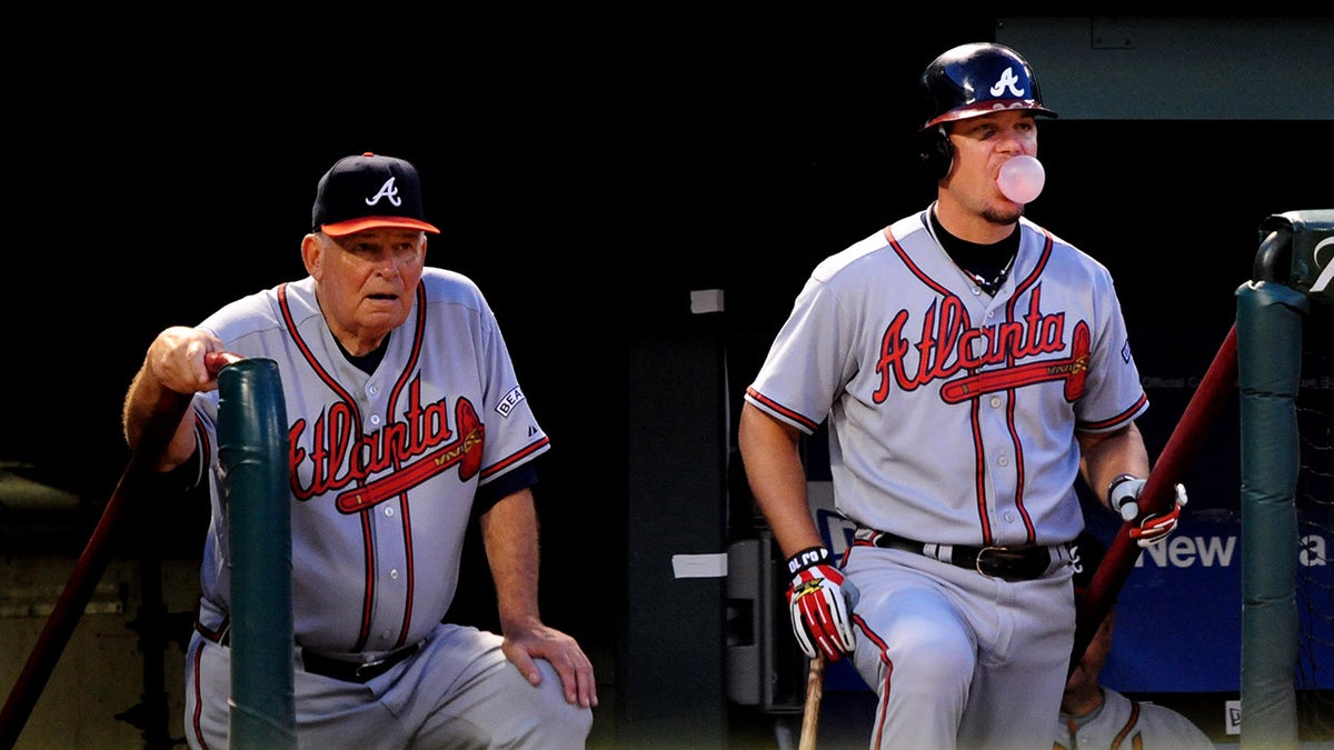 Bobby Cox and Chipper Jones in the Atlanta Braves dugout