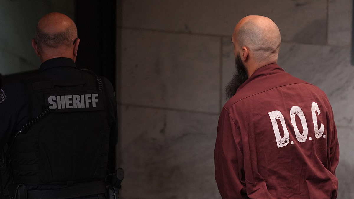 Cody Balmer walking into courthouse