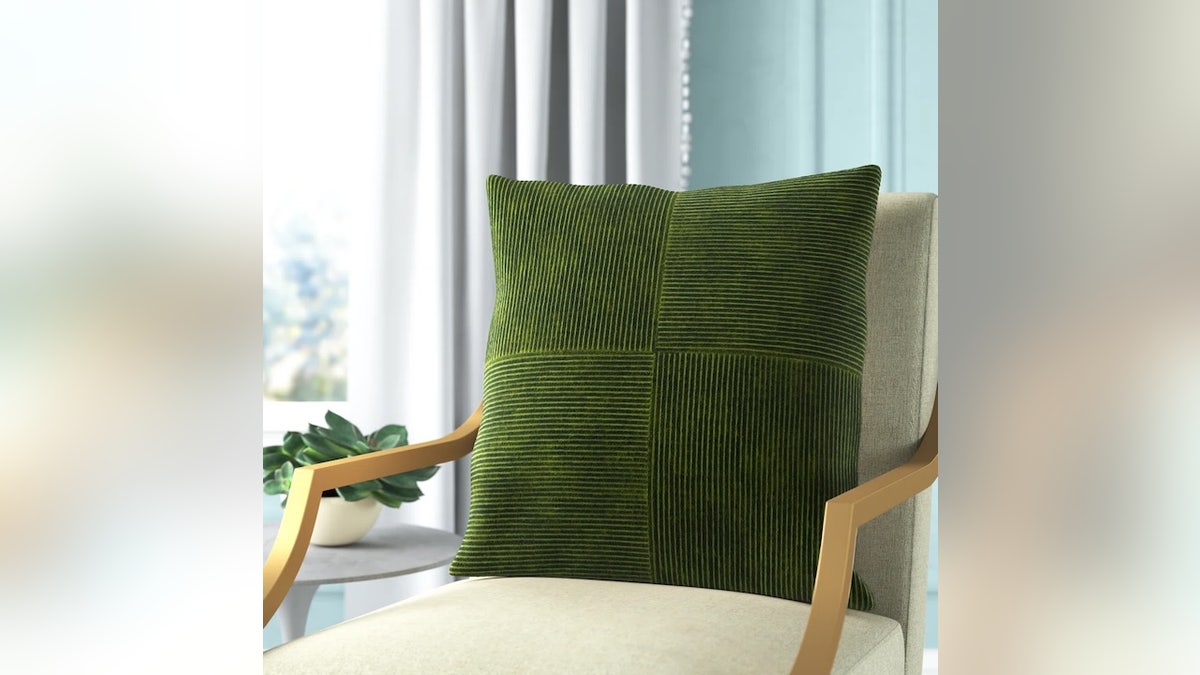 Transform a chair or sofa with a throw pillow.