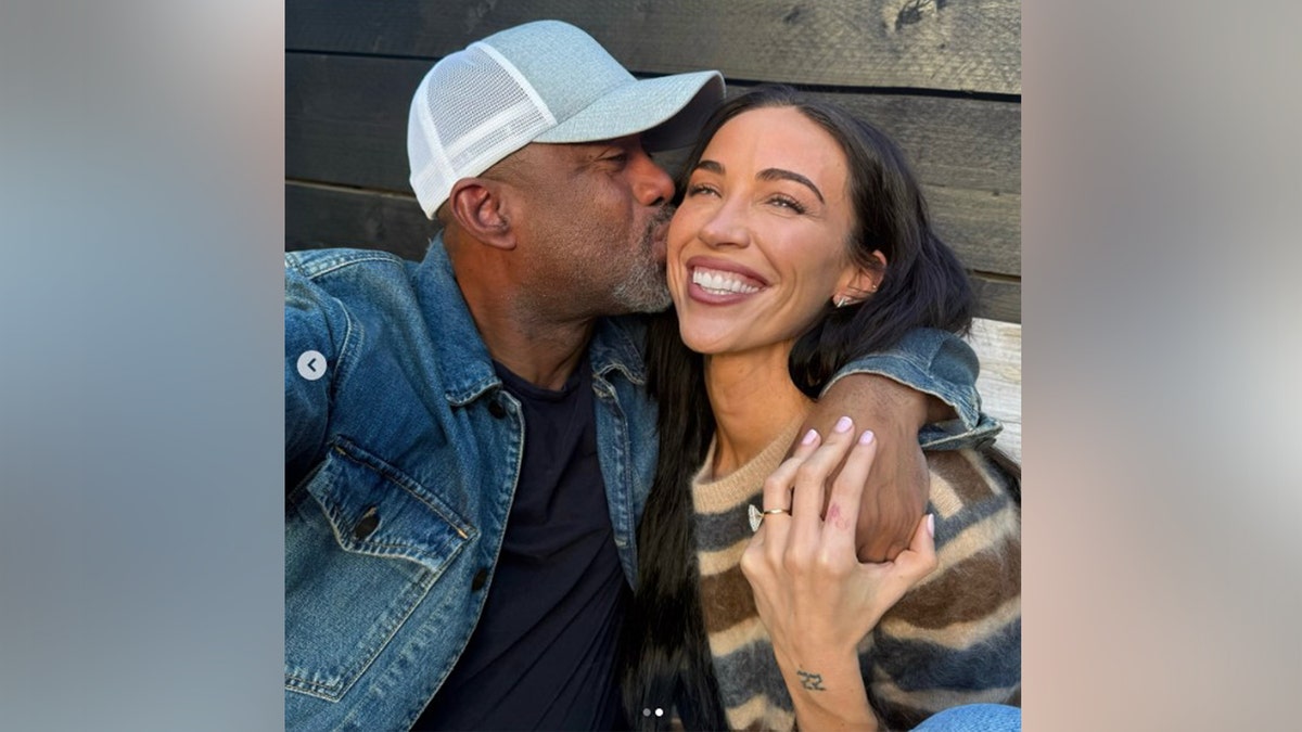 Rucker gave his new fiancé a kiss on the cheek to celebrate.