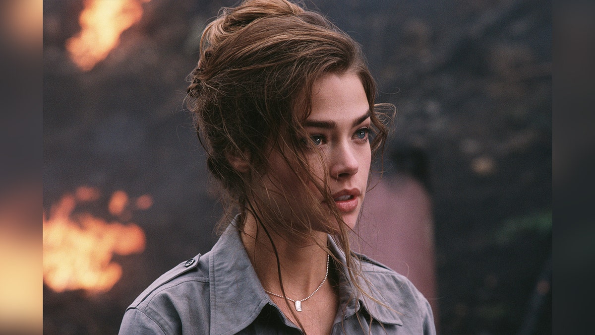 Denise Richards wears grey jacket as Bond Girl