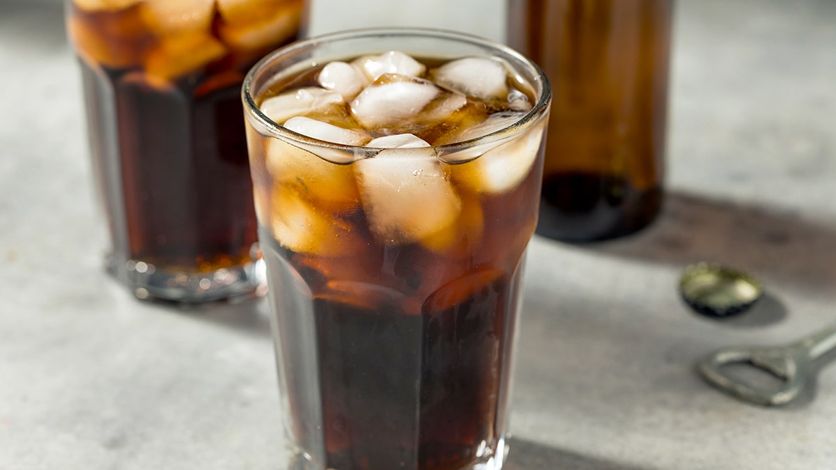 Cold Refreshing Dark Brown Cola with Ice Cubes