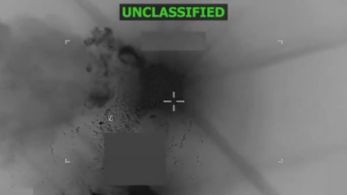 Infrared view of debris and smoke after U.S. nighttime strike on suspected drug vessel.
