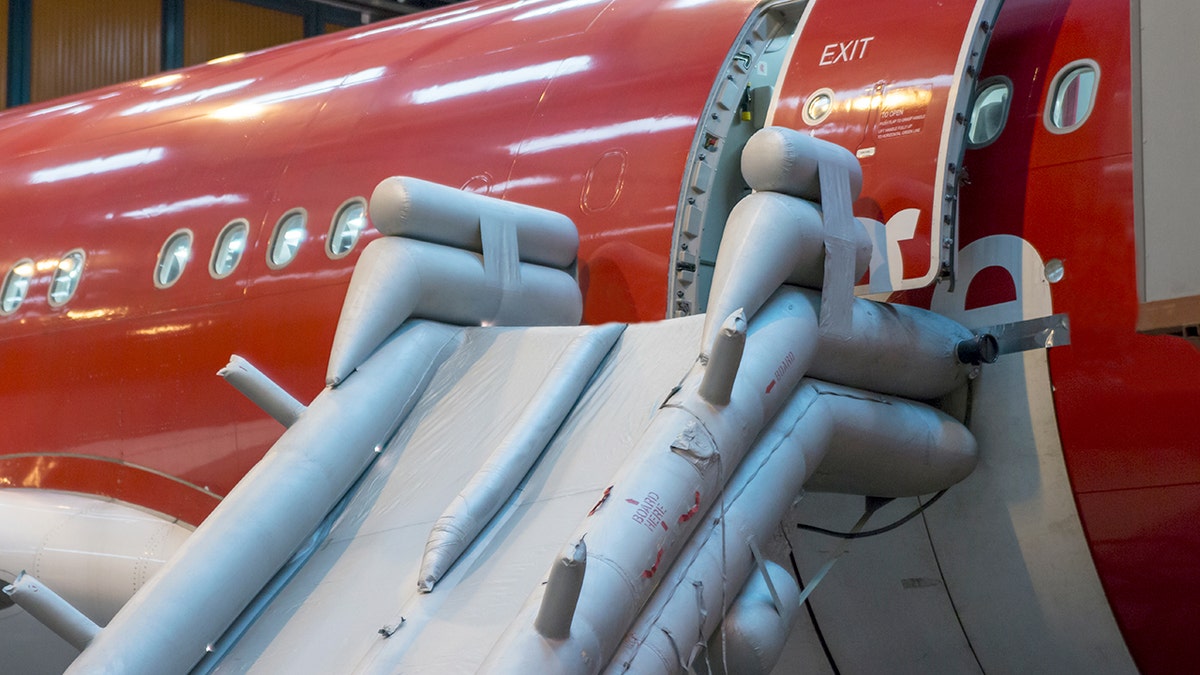 Close up on emergency slider of wide body aircraft.