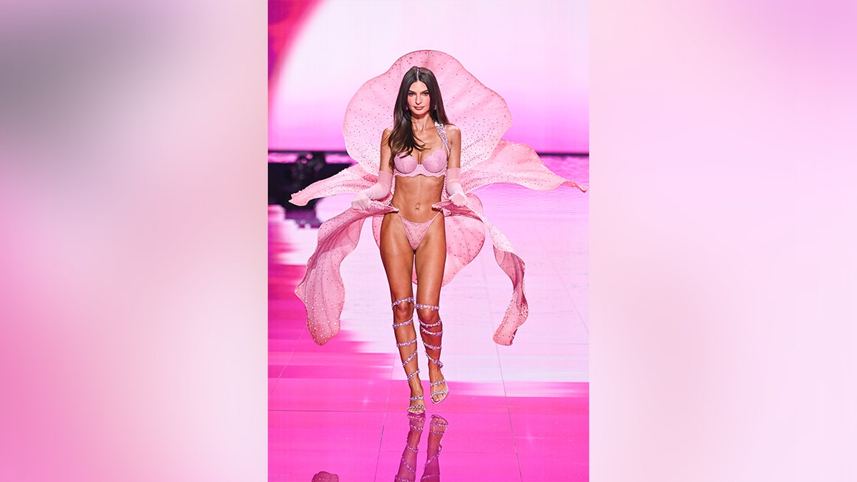 Emily Ratajkowski walked the runway at the Victoria's Secret Fashion Show in a pink lingerie set.