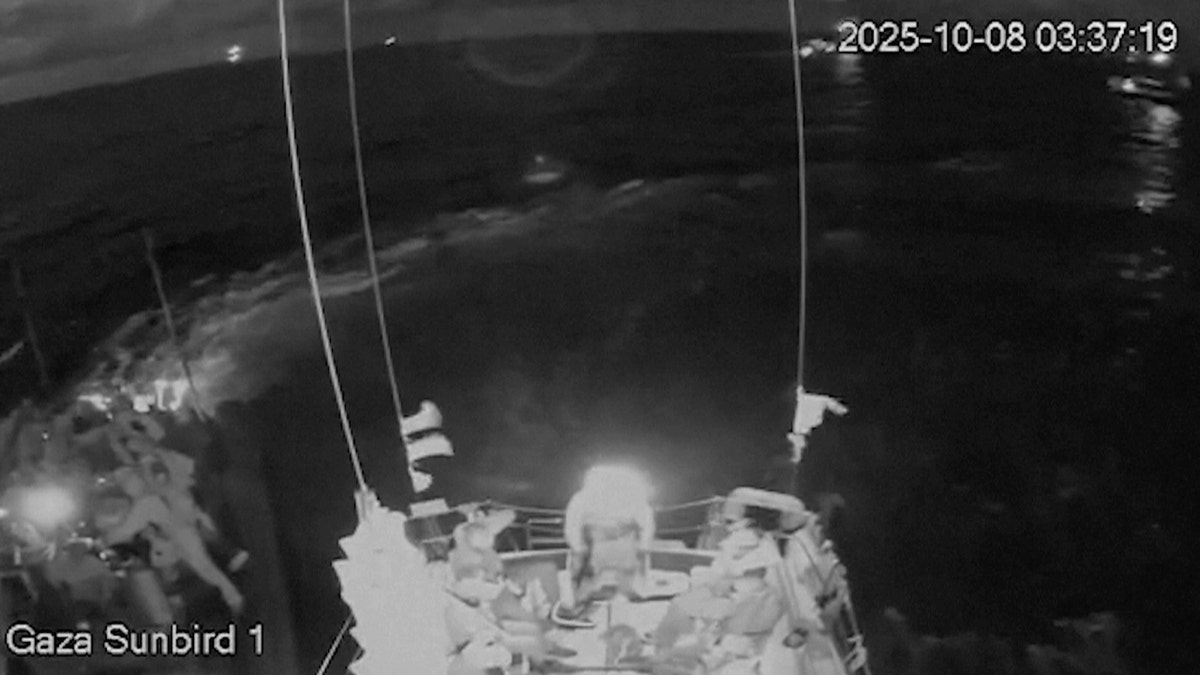 A shot from a flotilla live stream shows Israeli forces intercepting vessels
